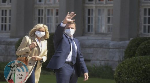 PARIS, FRANCE - JUNE 28: French President Emmanuel Macron (R) accompanied by his wife (L) leave after voting for the second round of municipal elections today in Paris, France on June 28, 2020. ( Francois Pauletto - Anadolu Agency )