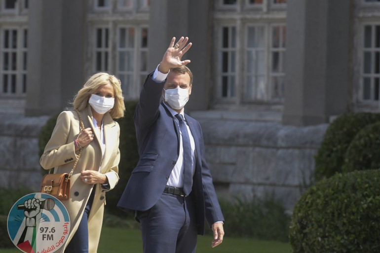 PARIS, FRANCE - JUNE 28: French President Emmanuel Macron (R) accompanied by his wife (L) leave after voting for the second round of municipal elections today in Paris, France on June 28, 2020. ( Francois Pauletto - Anadolu Agency )