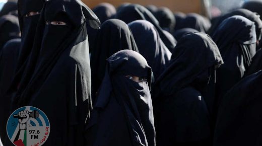 Women stand together al-Hol displacement camp in Hasaka governorate, Syria, April 2, 2019. REUTERS/Ali Hashisho