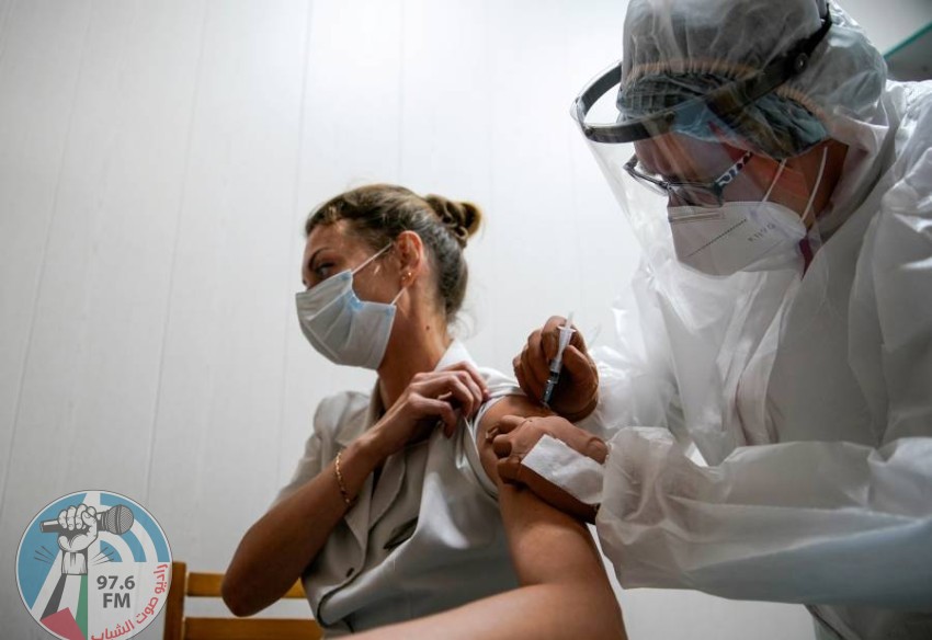 FILE PHOTO: A medic of the regional hospital receives Russia's "Sputnik-V" vaccine shot against the coronavirus disease (COVID-19) in Tver, Russia October 12, 2020. REUTERS/Tatyana Makeyeva/File Photo