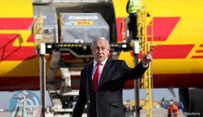 Israeli Prime Minister Benjamin Netanyahu attends the arrival of a DHL plane carrying a first batch of Pfizer/BioNTech COVID-19 vaccine, following the outbreak of the coronavirus disease (COVID-19), at Ben Gurion Airport near Tel Aviv, Israel December 9, 2020. Abir Sultan/Pool via REUTERS
