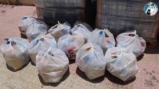 توزيع طرود غذائيه ومياه على اهالي المصابين بفيروس كورونا في الجنوب