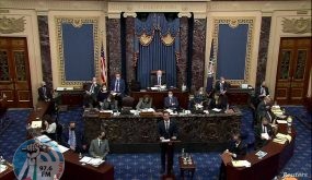 FILE PHOTO: U.S. House impeachment manager Rep. Eric Swalwell (D-CA) delivers part of the impeachment managers’ opening argument in the impeachment trial of former President Donald Trump, on charges of inciting the deadly attack on the U.S. Capitol, on the floor of the Senate chamber on Capitol Hill in Washington, U.S., February 10, 2021. U.S. Senate TV/Handout via Reuters/File Photo