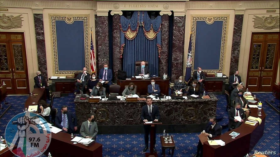 FILE PHOTO: U.S. House impeachment manager Rep. Eric Swalwell (D-CA) delivers part of the impeachment managers’ opening argument in the impeachment trial of former President Donald Trump, on charges of inciting the deadly attack on the U.S. Capitol, on the floor of the Senate chamber on Capitol Hill in Washington, U.S., February 10, 2021. U.S. Senate TV/Handout via Reuters/File Photo