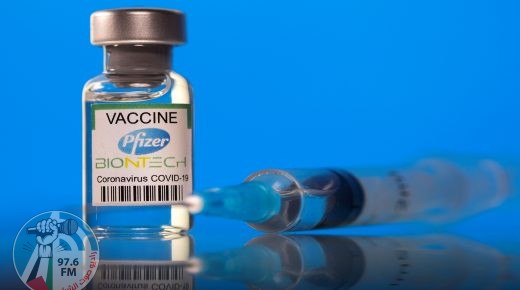 FILE PHOTO: A vial labelled with the Pfizer-BioNTech coronavirus disease (COVID-19) vaccine is seen in this illustration picture taken March 19, 2021. REUTERS/Dado Ruvic/Illustration/File Photo