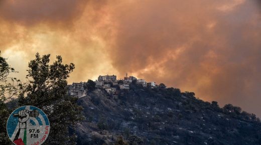 Smoke rises from a wildfire in the forested hills of the Kabylie region, east of the capital Algiers, on August 10, 2021. At least five people have died in raging wildfires in Algeria as firefighters battle more than 31 blazes amid blistering temperatures and tinder-dry conditions, officials said. (Photo by Ryad KRAMDI / AFP)