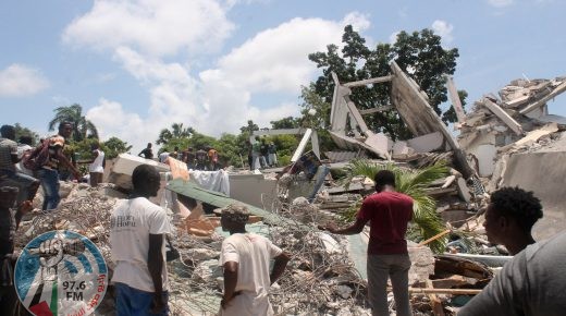 TOPSHOT - People search through the rubble of what used to be the Manguier Hotel after the earthquake hit on August 14, 2021 in Les Cayes, southwest Haiti. Rescue workers scrambled to find survivors after a powerful 7.2-magnitude earthquake struck Haiti early Saturday, killing at least 304 and toppling buildings in the disaster-plagued Caribbean nation still recovering from a devastating 2010 quake.
The epicenter of the shaking, which rattled homes and sent terrified locals scrambling for safety, was about 100 miles (160 kilometers) by road west of the center of the densely populated capital Port-au-Prince. (Photo by Stanley LOUIS / AFP)