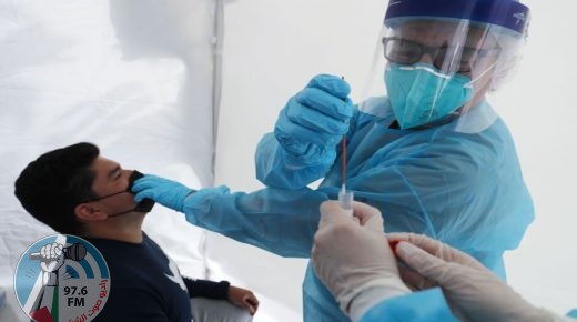 LOS ANGELES, CALIFORNIA - JULY 15: Dr. Glenn Lopez administers a COVID-19 test to Daniel Contreras at a St. Johns Well Child & Family Center mobile clinic set up outside Walker Temple AME Church in South Los Angeles amid the coronavirus pandemic on July 15, 2020 in Los Angeles, California. A clinic official said most of the residents they are currently testing in their South L.A. clinics are Latinos. According to the California Department of Health, Latinos are currently 2.9 times more likely than white people to test positive for the coronavirus. California reported over 11,000 new coronavirus infections today, the most in the state in a single day since the pandemic began. Mario Tama/Getty Images/AFP
== FOR NEWSPAPERS, INTERNET, TELCOS & TELEVISION USE ONLY ==