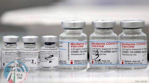 FILE PHOTO: Vials of coronavirus disease (COVID-19) vaccines of Pfizer-BioNTech and Moderna are seen in the town of Ricany near Prague, Czech Republic, February 25, 2021. REUTERS/David W Cerny/File Photo