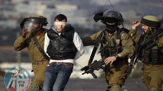 Israeli soldiers arrest a Palestinian during clashes with Israeli troops at a protest against the Jewish settlement of Ofra, in the West Bank village of Silwad, near Ramallah January 17, 2014. REUTERS/Mohamad Torokman (WEST BANK - Tags: POLITICS CIVIL UNREST MILITARY TPX IMAGES OF THE DAY) ORG XMIT: SJS08