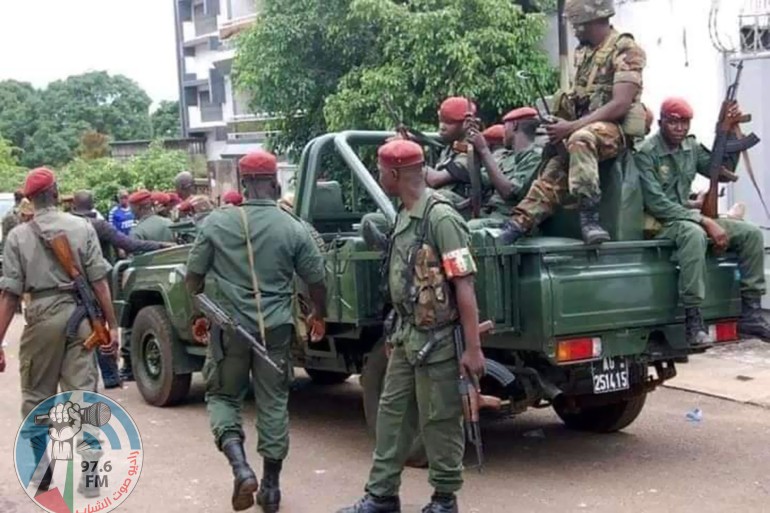 epa09449680 Guinean military deploy on the streets of Conakry, Guinea, 05 September 2021. According to a video broadcasted on state television, Guinea's President Alpha Conde has been detained by army special forces in Conakry as gunfire was heard on the streets of the centre of Guinea's capital. Guinea Colonel Mamady Doumbouya spoke on a state television broadcast saying President Alpha Conde was in custody and warned people to stay indoors. EPA-EFE/STR BEST QUALITY AVAILABLE