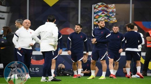 France's assistant coach Guy Stephan (L), France's defender Leo Dubois (C) and France's defender Lucas Hernandez (R) arrive for a training session at the San Siro Stadium in Milan on October 9, 2021, on the eve of the UEFA Nations League final football match between Spain and France. (Photo by FRANCK FIFE / AFP)