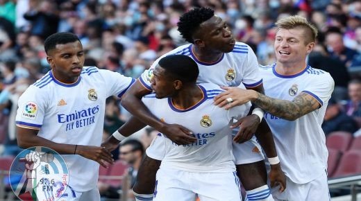 Real Madrid's Austrian defender David Alaba (2L) celebrates scoring the opening goal during the Spanish League football match between FC Barcelona and Real Madrid CF at the Camp Nou stadium in Barcelona on October 24, 2021. (Photo by Josep LAGO / AFP)