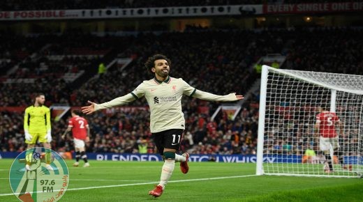 TOPSHOT - Liverpool's Egyptian midfielder Mohamed Salah celebrates after scoring their fifth goal, his third during the English Premier League football match between Manchester United and Liverpool at Old Trafford in Manchester, north west England, on October 24, 2021. RESTRICTED TO EDITORIAL USE. No use with unauthorized audio, video, data, fixture lists, club/league logos or 'live' services. Online in-match use limited to 120 images. An additional 40 images may be used in extra time. No video emulation. Social media in-match use limited to 120 images. An additional 40 images may be used in extra time. No use in betting publications, games or single club/league/player publications. (Photo by Oli SCARFF / AFP) / RESTRICTED TO EDITORIAL USE. No use with unauthorized audio, video, data, fixture lists, club/league logos or 'live' services. Online in-match use limited to 120 images. An additional 40 images may be used in extra time. No video emulation. Social media in-match use limited to 120 images. An additional 40 images may be used in extra time. No use in betting publications, games or single club/league/player publications.