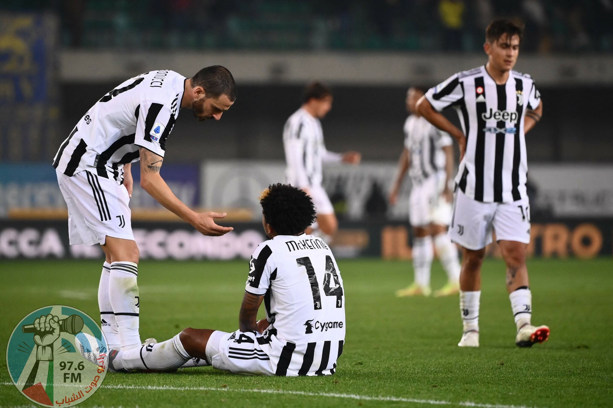 Juventus' Italian defender Leonardo Bonucci, Juventus' US midfielder Weston McKennie and Juventus' Argentine forward Paulo Dybala react at the end of the Italian Serie A football match between Hellas Verona and Juventus on October 30, 2021 at the Bentegodi stadium in Verona. (Photo by Marco BERTORELLO / AFP)