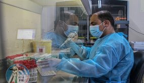 (210924) -- GAZA, Sept. 24, 2021 (Xinhua) -- A medical worker works at a testing lab for COVID-19 at Al-Rimal Clinic in Gaza City, on Sept. 23, 2021. TO GO WITH: "Gazans fear deteriorating health situation amid Delta variant spread" (Photo by Rizek Abdeljawad/Xinhua)