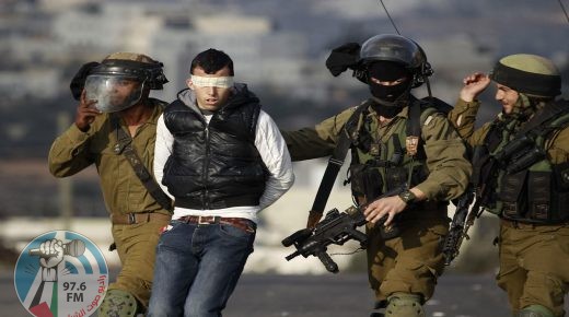 Israeli soldiers arrest a Palestinian during clashes with Israeli troops at a protest against the Jewish settlement of Ofra, in the West Bank village of Silwad, near Ramallah January 17, 2014. REUTERS/Mohamad Torokman (WEST BANK - Tags: POLITICS CIVIL UNREST MILITARY TPX IMAGES OF THE DAY) ORG XMIT: SJS08