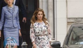 FILE - In this Wednesday, July 31, 2019 file photo, Princess Haya Bint al-Hussein leaves The High Court in London. Britain's High Court found Wednesday, Oct. 6, 2021 that the ruler of Dubai, Sheikh Mohammed bin Rashid Al Maktoum, hacked the phones of his ex-wife Princess Haya and her attorneys during their legal battle over custody of their two children. (AP Photo/Alastair Grant, file)