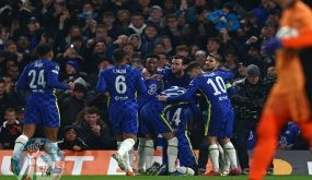 Chelsea's English defender Trevoh Chalobah celebrates with teammates after scoring the opening goal of the UEFA Champions League Group H football match between Chelsea and Juventus at Stamford Bridge in London on November 23, 2021. (Photo by Adrian DENNIS / AFP)