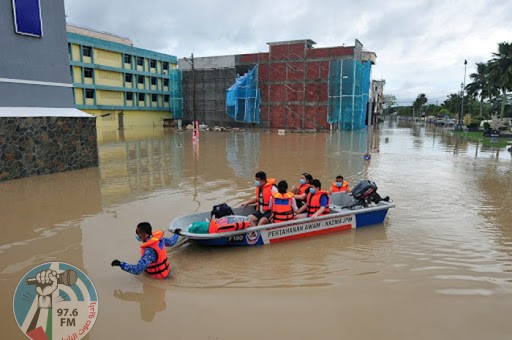 “ماليزيا” 14 قتيلا على الأقل إثر فيضانات عارمة