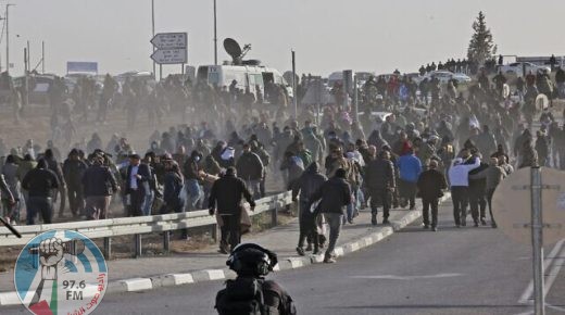Bedouin protesters and Israeli forces clash during a protest in the southern Israeli village of Sawe al-Atrash in the Neguev Desert against an afforestation project by the Jewish National Fund (JNF), on January 13, 2022. - Bedouin, who are part of Israel's 20 percent Arab minority, have long opposed tree-planting initiatives in the Negev, blasting them as a de facto government land grab in areas they call home. (Photo by Menahem KAHANA / AFP)