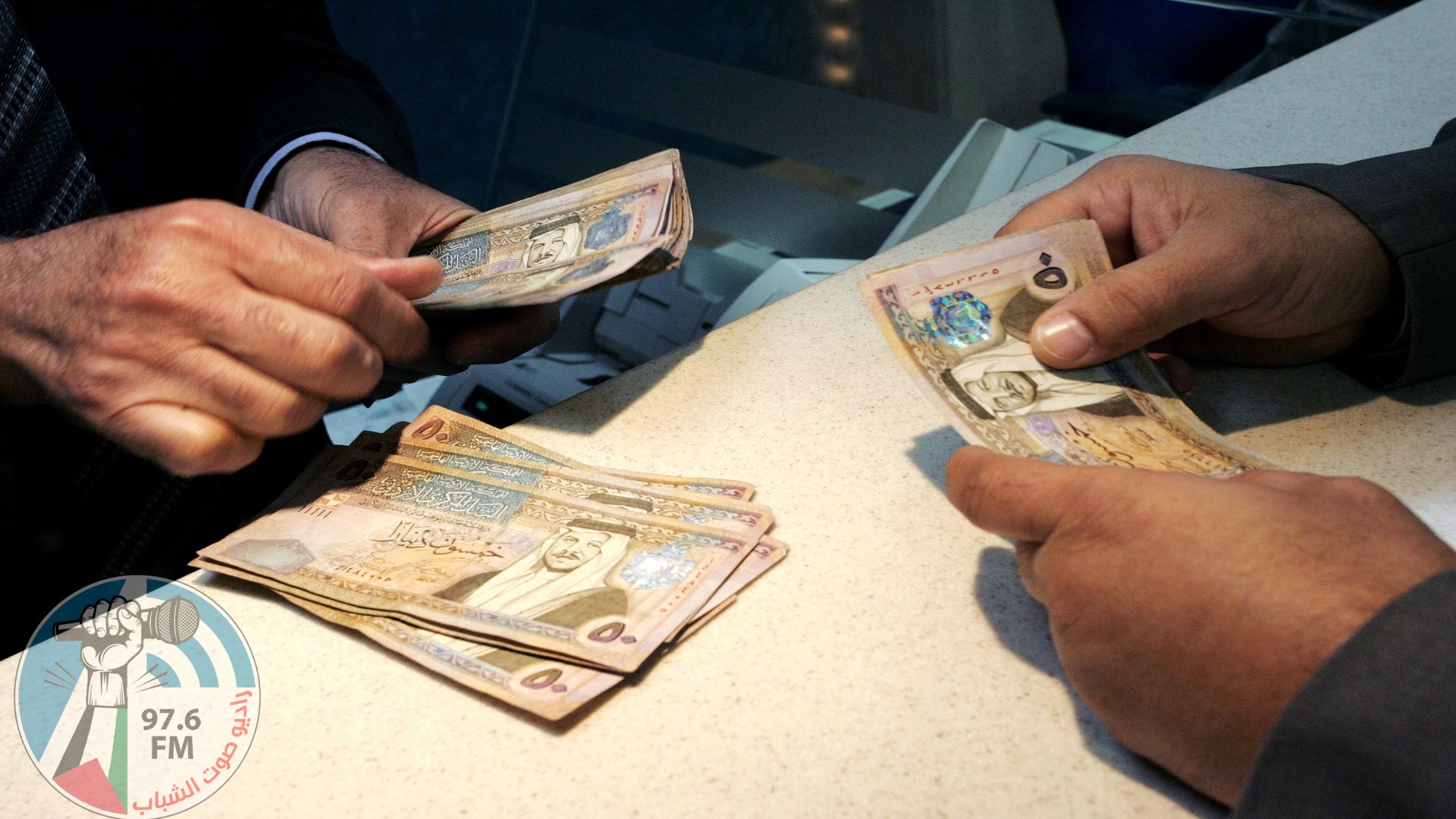 Counting Money in bank, Aman, Jordan