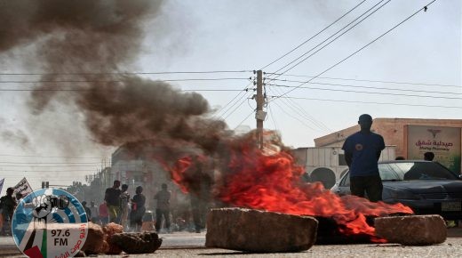 Sudanese rally against a military coup which occurred nearly three months ago, south of the capital Khartoum, on January 17, 2022. Thousands rallied again in Sudan to oppose a military coup which occurred nearly three months ago but security forces quickly fired tear gas towards them. (Photo by Ebrahim HAMID / AFP)