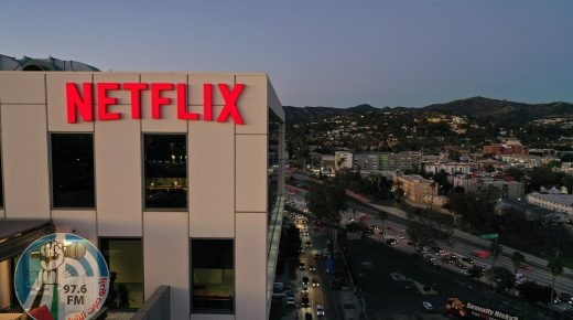(FILES) In this file photo taken on January 20, 2022 the Netflix logo is seen on top of their office building in Hollywood, California. One day after shares of at-home fitness company Peloton tumbled, Netflix found itself in Wall Street's hot seat January 21, 2022 as markets reassess the diminishing growth prospects of so-called "pandemic stocks." (Photo by Robyn Beck / AFP)