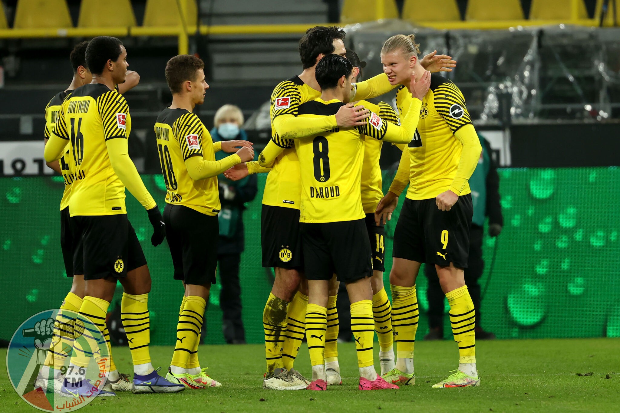 (220115) -- DORTMUND, Jan. 15, 2022 (Xinhua) -- Erling Haaland (1st R) of Dortmund celebrates scoring with his teammates during the German first division Bundesliga football match between Borussia Dortmund and SC Freiburg in Dortmund, Germany, Jan. 14, 2022. (Photo by Joachim Bywaletz/Xinhua)