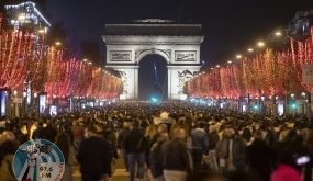 (220101) -- PARIS, Jan. 1, 2022 (Xinhua) -- People gather at the Champs Elysees Avenue to celebrate the New Year in Paris, France, Dec. 31, 2021. (Xinhua)