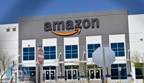 (FILES) In this file photo taken on April 25, 2020 the main entrance to one of Amazon distribution centers is seen as the coronavirus continues to spread across the United States, in North Las Vegas, Nevada. Amazon's online commerce empire is taking another step into the real world with plans announced January 20, 2022 to open a shop in Los Angeles that would be its first bricks-and-mortar clothing store. (Photo by David Becker / AFP)