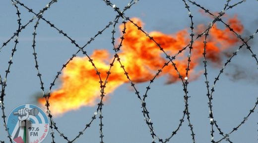 (FILES) In this file photo taken on March 22, 2005, a gas flame is seen behind a barbed wire in the former at the Rosneft oil company production plant in Prirazlomnoye field, located in the Pechora Sea, south of Novaya Zemlya, Russia. The US and its European allies are scouring global markets for alternative energy sources to mitigate fallout from any conflict with major energy exporter Russia over Ukraine, a senior US official said on January 25, 2022. (Photo by TATYANA MAKEYEVA / AFP)