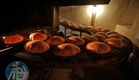 (FILES) In this file photo taken on July 1, 2020 freshly-baked bread moves along a production line out of an oven at an automated bakery in Lebanon's capital Beirut. Russia's invasion of Ukraine could mean less bread on the table in Egypt, Lebanon, Yemen and elsewhere in the Arab world where millions already struggle to survive. The region is heavily dependent on wheat supplies from the two countries which are now at war, and any shortages of the staple food have potential to bring unrest. (Photo by JOSEPH EID / AFP)