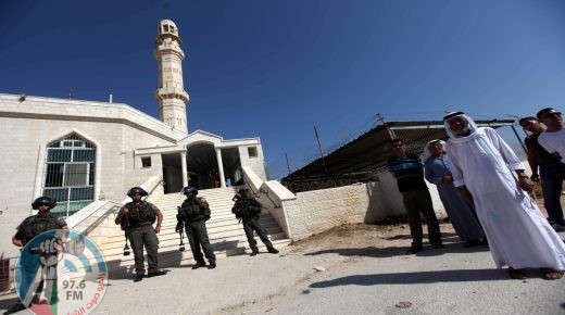 Israeli border police officers stand outside a damaged mosque in West Bank village of Jaba near Ramallah June 19, 2012. The mosque in the occupied West Bank was vandalised and set on fire early on Tuesday, in an attack Palestinians blamed on Israeli settlers. Photo by Issam Rimawi
