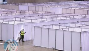 Construction at the COVID-19 field hospital at McCormick Place in Chicago on April 10. The city pared back plans for a 3,000-bed temporary hospital at the nation's largest convention center as infection numbers decreased.