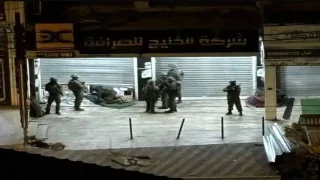 قوات الاحتلال تعتقل شابين وتداهم محلا للصرافة في نابلس